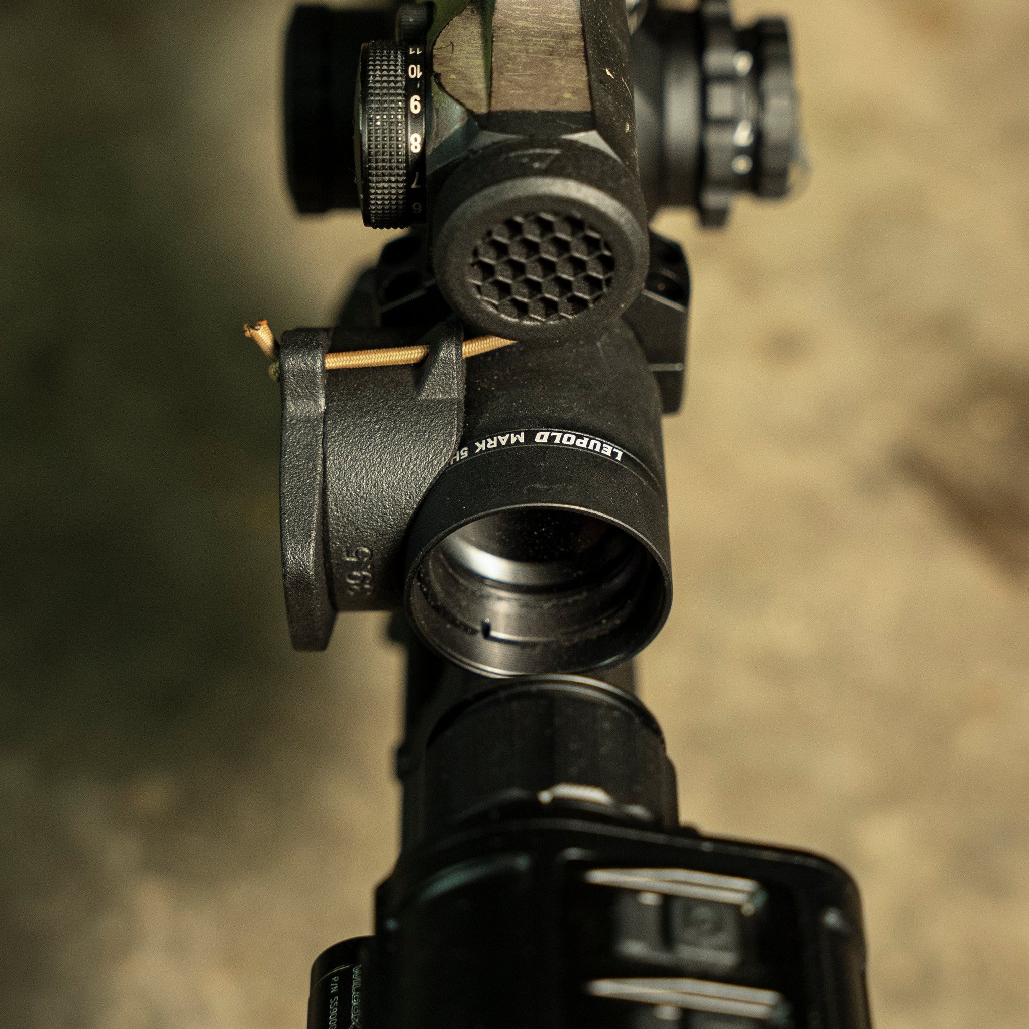 One of the biggest pieces of feedback we've received on our products is the difficulty of installation and battery changes when using our ScopeCap ™ and LightCap ™ products. By developing a locking ring with eyelets to fit the shock cord, we were able to completely eliminate the need for ranger bands and looping the shock cord around the light or optic body.

