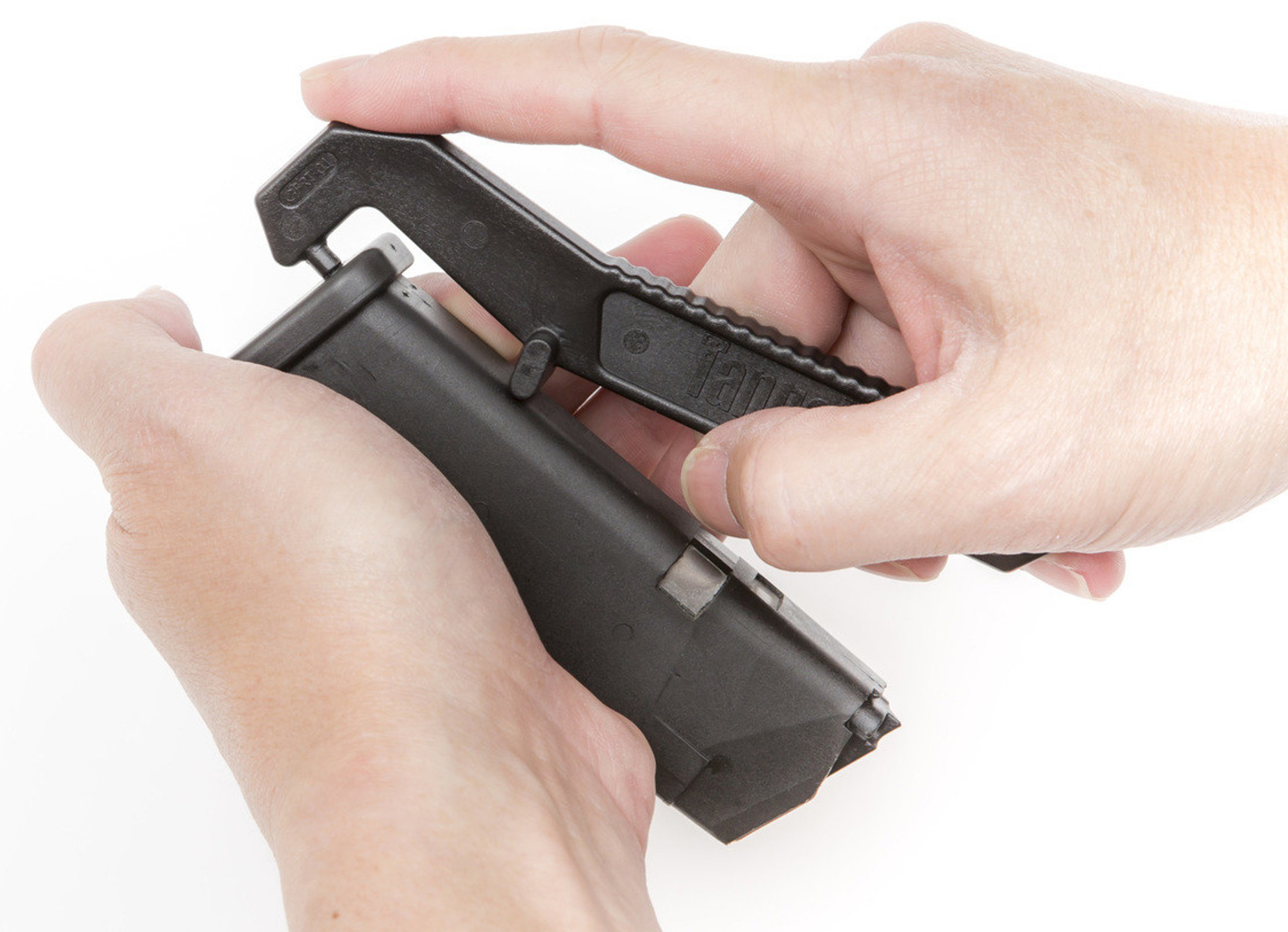 TangoDown Magazine Floorplate / Base pad Removal Tool For Glock®
High quality components and precise manufacturing make Tango Down parts ideal for maintaining and upgrading firearms. The durability, reliability and excellent build quality of these parts will ensure years of service you can count on.

Glock® factory magazines are pretty much the Gold Standard for strength and reliability. They are proven through decades of serious abuse by Law Enforcement and Military units and contribute to Glock®’s legendary reputation for fail-safe function.

However, they are not maintenance-free. Extreme environmental conditions such as mud, dust and excessive carbon from suppressor use, can affect the overall performance of the pistol. To keep your magazines functioning as they should in these extremes, they require periodic inspection and cleaning.

But Glock® floorplate removal can be difficult at best, without the proper tool. Our GFRT-01 makes that job easy! Designed to remove floorplates of all Gen 1 through Gen 5 OE magazines, the GFRT-01 uses just the right amount of leverage to draw the floorplate off the magazine body without damage. Injection molded of tough Nylon, keep a few around- in your toolbox, range bag or pistol case.

(Will NOT work on Glock® 36 OE, G42/43 OE Finger Rest -style floorplates. Not recommended for the Glock G43X/48. )