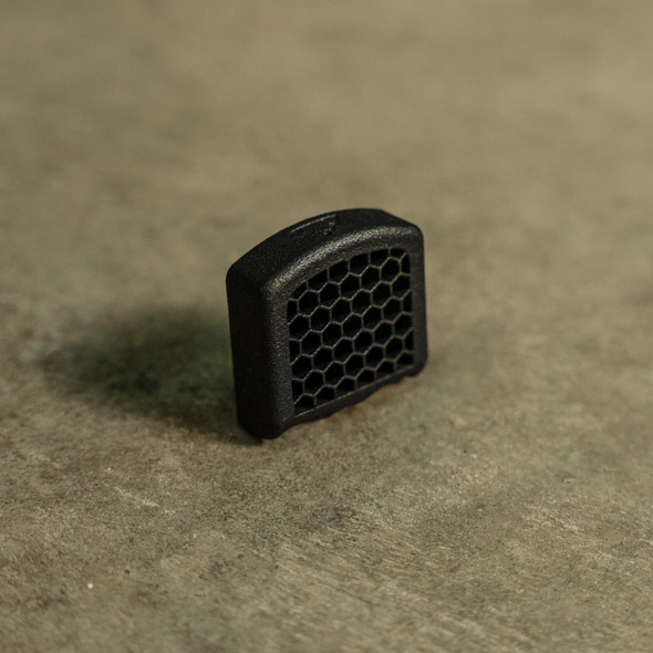 The HexCap is a ruggedly simple, snap-fit Anti-Reflection Device (ARD) that installs securely in seconds to your red dot sight with no additional hardware.
