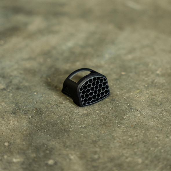 The HexCap is a ruggedly simple, snap-fit Anti-Reflection Device (ARD) that installs securely in seconds to your red dot sight with no additional hardware.
