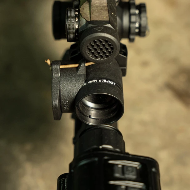 The Cap itself is a simple, rugged, and low-profile solution to protect your scope's lenses and eliminate any reflections from them when not in use. Our signature flipper tab is integral to the ScopeCap and allows for fast and easy removal from your scope's bezel. When doffed, they have a lower profile than traditional flip style scope caps.

