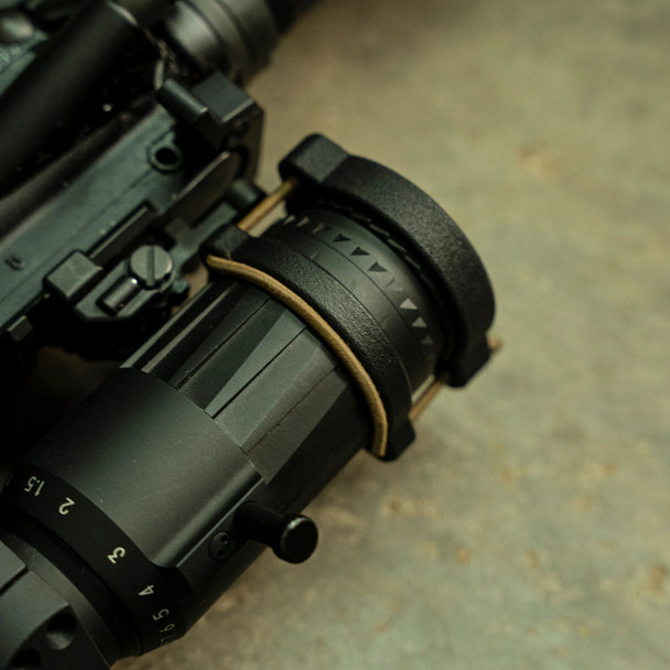 One of the biggest pieces of feedback we've received on our products is the difficulty of installation and battery changes when using our ScopeCap ™ and LightCap ™ products. By developing a locking ring with eyelets to fit the shock cord, we were able to completely eliminate the need for ranger bands and looping the shock cord around the light or optic body.

