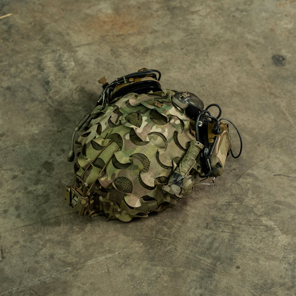 HelmetScrim attaches to your high-cut helmet, breaking up its silhouette and improving its camouflage in both the visible and IR spectrums. It attaches via a simple shock cord, stretching over your helmet, and has a rectangular cut out for your NVG mount. It is made in the US using licensed camouflage patterns and durable, NIR compliant materials.

