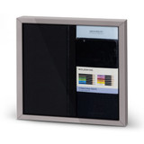 A Moleskine bundle featuring a black sketchbook and a set of 12 watercolour pencils, presented in a sleek frame.