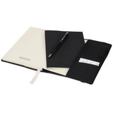 A black notebook and a black pen inside a black leather-like gift set, with a smaller white notebook included.