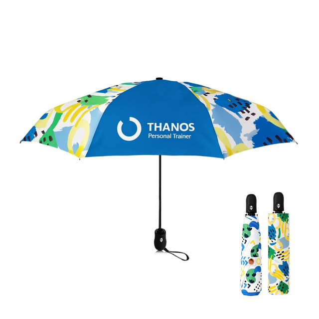 A compact, multi-coloured auto umbrella with a blue top and decorative patterns, featuring a logo on one side.