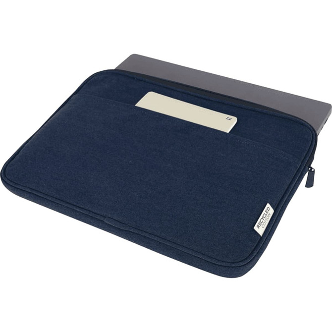 A navy recycled canvas laptop sleeve featuring a front pocket and a zip closure. The display includes a grey laptop inside.