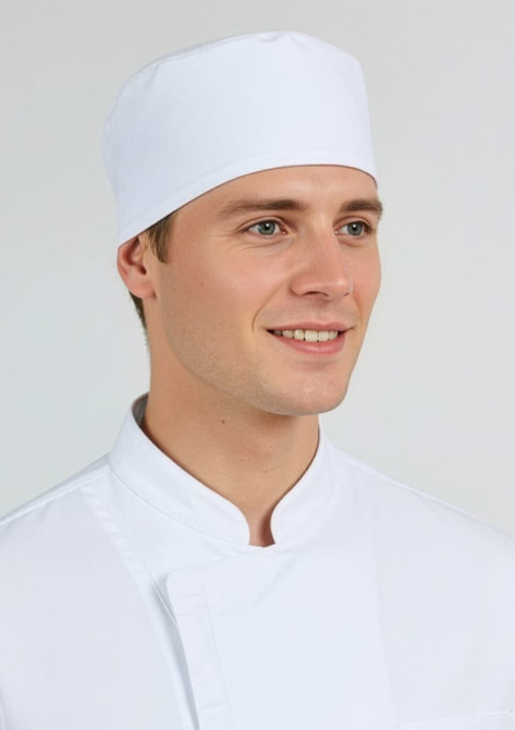 A white mesh flat top hat worn by a smiling male model in a white chef's uniform. The hat has a simple design and branding.
