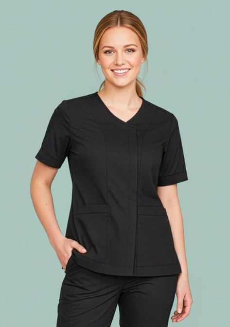A black women's scrub top featuring a zip front and crossover design, displayed on a model against a light green background.