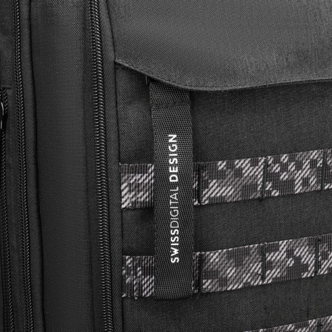 Close-up of Swissdigital Design black backpack with digital camouflage accents.