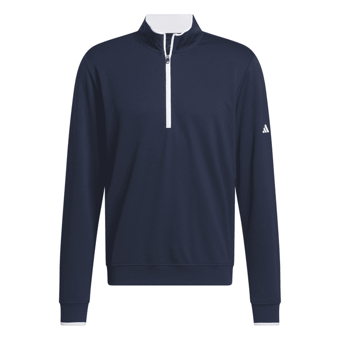 A navy blue lightweight quarter zip pullover with a white collar and a logo on the sleeve.