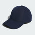A navy blue six-panel cap with a curved brim and a logo on the front.