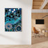 Indigenous artwork with vibrant blue patterns and handprints in modern office space.