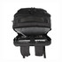Open black backpack with laptop, phone, and charging cable inside, shown from above.