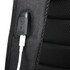 USB charging port on black backpack fabric.