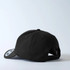 Black snapback baseball cap with adjustable strap on white background.