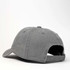 A grey cotton canvas unstructured 6 panel cap featuring a curved brim and an adjustable strap at the back.