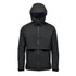 A dark grey technical shell jacket with a hood, featuring a zip closure and a cropped design. Branding is visible.