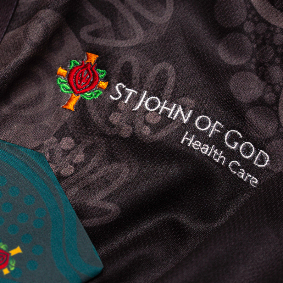 Close-up of black fabric with embroidered 