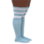 Side view of blue plus size thigh high socks with three white stripes at the top, worn on model
