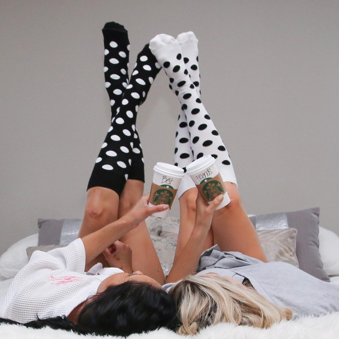 girls drinking coffee with spotted socks black and white