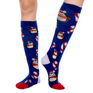 Knee high sock with penguins and candy canes