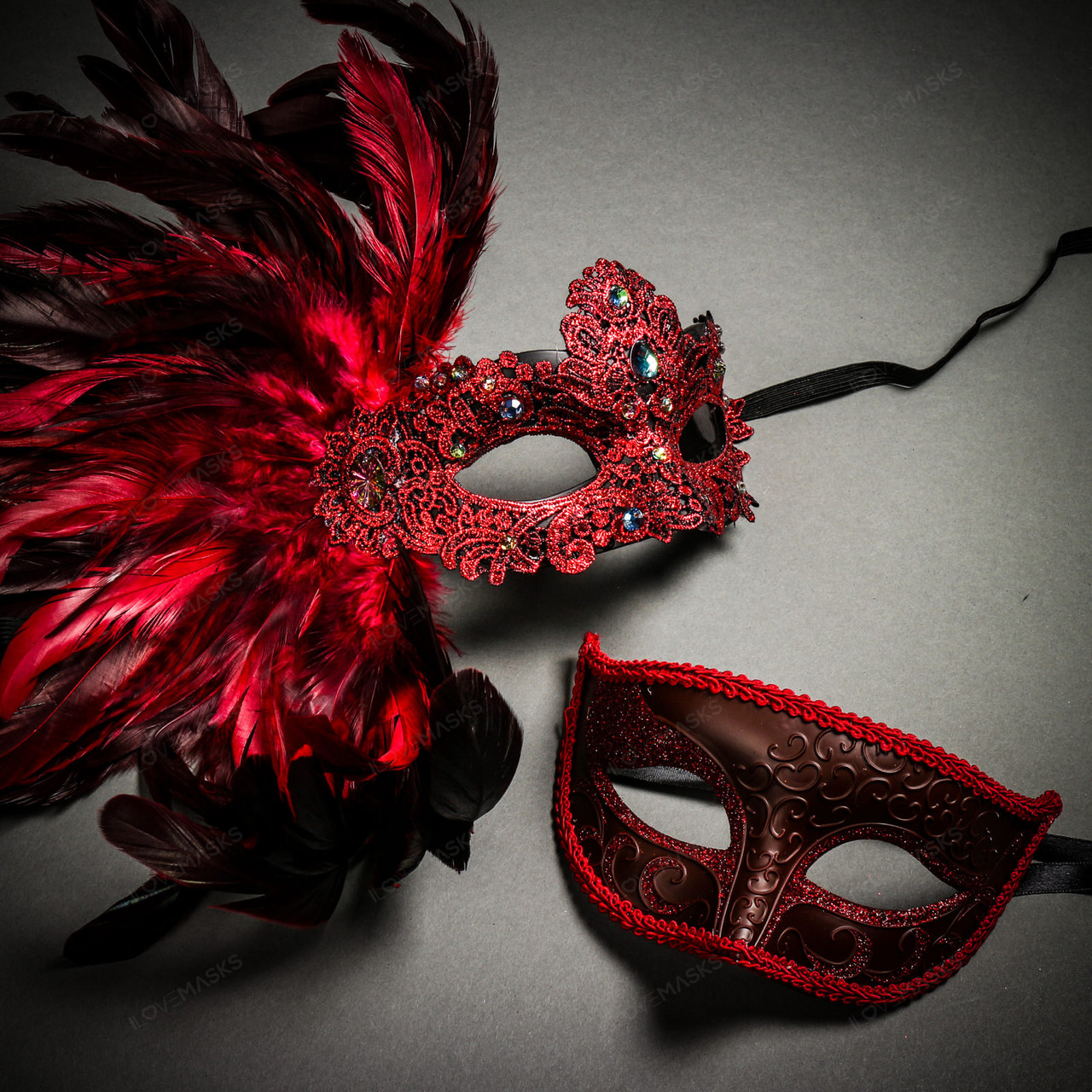 black and red masquerade mask with feathers