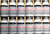 Twelve 75 gram bottles of PEA grade Calcium Carbide
