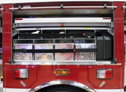 Fire apparatus compartment setup using Zico variable strap mounting hardware