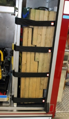 Zico variable strap system holding tools during emergency vehicle transport