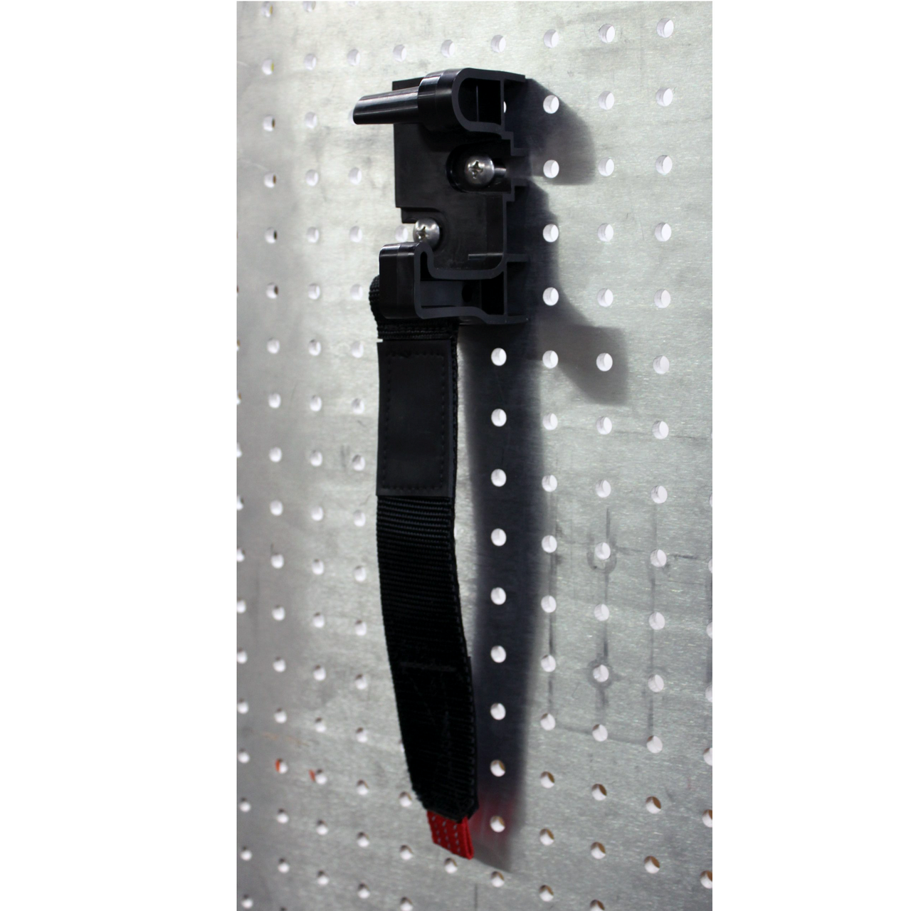 Zico SURE-GRIP mount holding hand tool on emergency vehicle