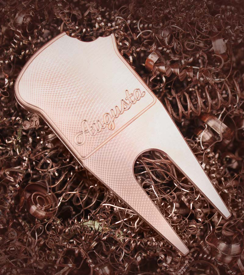 Pimento time divot tool is made from solid billet copper and repairs