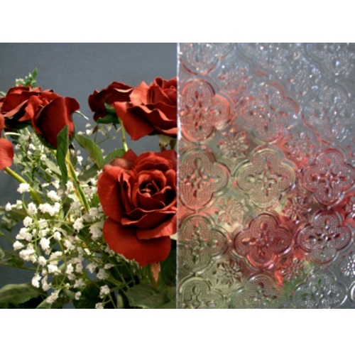 Morisco Pattern Clear Textured Glass (IM-1008) has the vintage feel of Old World antique pressed glass. The distinct quatrefoil pattern provides a distinct decorative element with high degree of obscurity.
