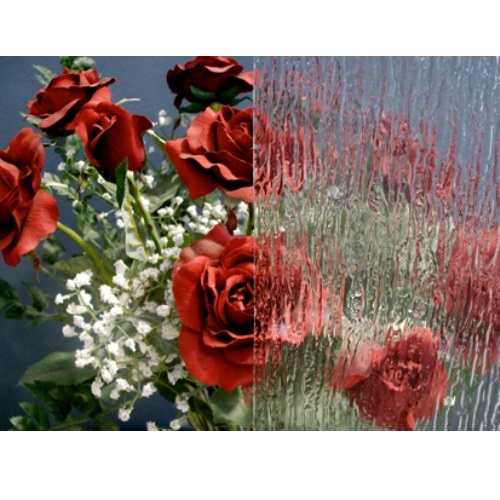 Rain Pattern Clear Textured Glass (IM-1103) has the modern feel of a rolled architectural art glass. This soft and distinct pattern is reminiscent of a rain pelted windowpane and imparts a moderate degree of obscurity.