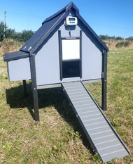 Super coop   with insulated roof, automatic opener, tall stand, pull out tray. single nest box with moveable dividers.