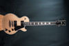 Schecter Solo-II Custom Electric Guitar in Gloss Natural finish with single-cut body, dual humbuckers, and chrome hardware.