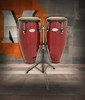 Toca Synergy Conga Set 10"/11" - Red (2300RR) featuring two red congas with matching hardware, warm resonant shells, and an included adjustable double stand.