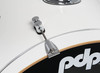 The PDP Concept Maple 7-Piece Drum Set (PDCM2217PW) features all-maple shells for warm resonance, punchy attack, and excellent projection. Finished in a striking pearlescent white with chrome hardware, this kit includes full tom and kick configurations suitable for advanced players. Designed with pro-level build quality and tonal versatility for studio sessions, live performance, and high-demand practice environments.