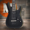 Schecter Demon-7 Electric Guitar - Aged Black Satin finish featuring 7-string configuration, Schecter Diamond Active pickups, arched top body, and smooth fast neck for powerful modern metal tone