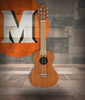 The Lanikai MA-6T Tenor Ukulele features a mahogany top, back, and sides that deliver warm, resonant tone with smooth mids. Its 6-string configuration pairs strings in octave and unison courses, adding depth and fullness to chords and melodies. With comfortable tenor sizing, quality tuners, and clean craftsmanship, i-s an excellent choice for players seeking a lush, full-bodied ukulele sound.