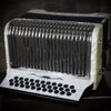 Hohner Corona II XTREME Accordion - GCF, Pearl White finish, 31-button diatonic accordion featuring smooth bellows, responsive reeds, and premium craftsmanship for professional performers