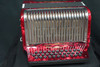 The Hohner Corona II XTREME FBbEb diatonic accordion in pearl red (CXFR) delivers powerful projection and fast response, ideal for norteÃ±o and conjunto styles. Available at Musician Madness.