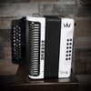The Hohner Corona C-II FBbEb White Rainbow Accordion delivers radiant style and rich tone. Perfect for Tex-Mex, NorteÃƒÂ±o, and Cumbia players seeking premium sound.