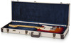 Gator Journeyman Series Electric Guitar Case (GW-JM ELEC) featuring a vintage brown exterior, crushed velvet interior lining, reinforced hardware, and molded fit protection for standard electric guitars.