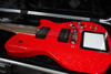 Cort Manson MBM-1 Electric Guitar in Red Santa finish â€“ signature model featuring integrated Kaoss Pad, Sustainiac pickup system, and ergonomic modern body design