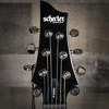 Schecter Omen-6 Left-Handed Electric Guitar in Gloss Black finish - dual humbuckers, contoured body, and hardware designed for left-handed players