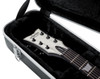 Gator Deluxe ABS Molded Case for Single-Cutaway Electric Guitar featuring rugged ABS exterior, plush padded interior, reinforced latches, molded neck support, and secure protection for single-cut electric guitars.
