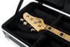 Gator GC-BASS Deluxe ABS Molded Electric Bass Guitar Case (GC-BASS) featuring a tough ABS exterior, soft padded interior, reinforced latches, and full-length neck support for secure electric bass guitar protection.