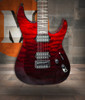 Schecter Reaper-6 Elite electric guitar in Bloodburst featuring a striking gradient finish, carved top design, high-output pickups, fast-playing neck, and premium Elite-series construction.