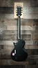 ESP LTD EC-1000 Baritone Electric Guitar in Charcoal Metallic Satin finish â€“ single-cutaway body with EMG pickups, extended scale neck, and matte hardware